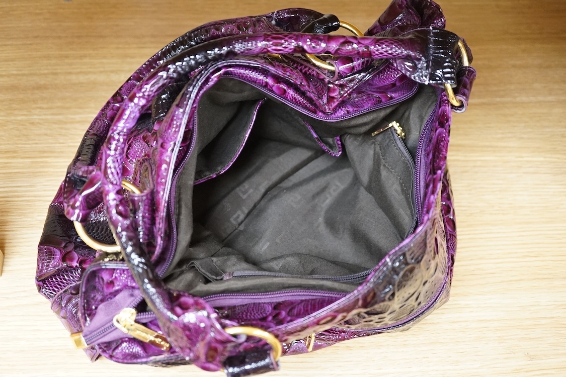 A purple patent Versace large handbag, approximately 41cm wide